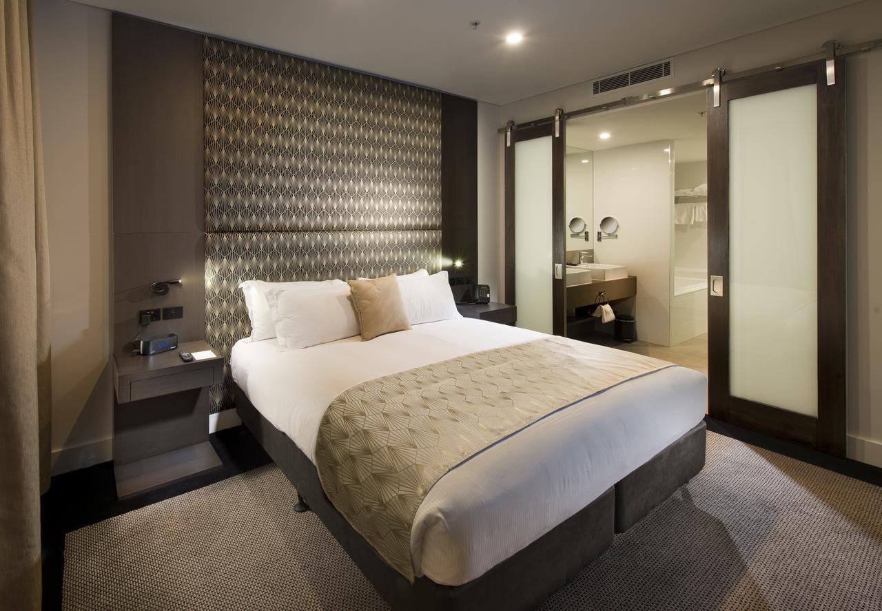 Отель Pullman Brisbane Airport Экстерьер фото A bedroom at the hotel